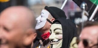 Protesto com a máscara de Guy Fawkes, V de Vingança